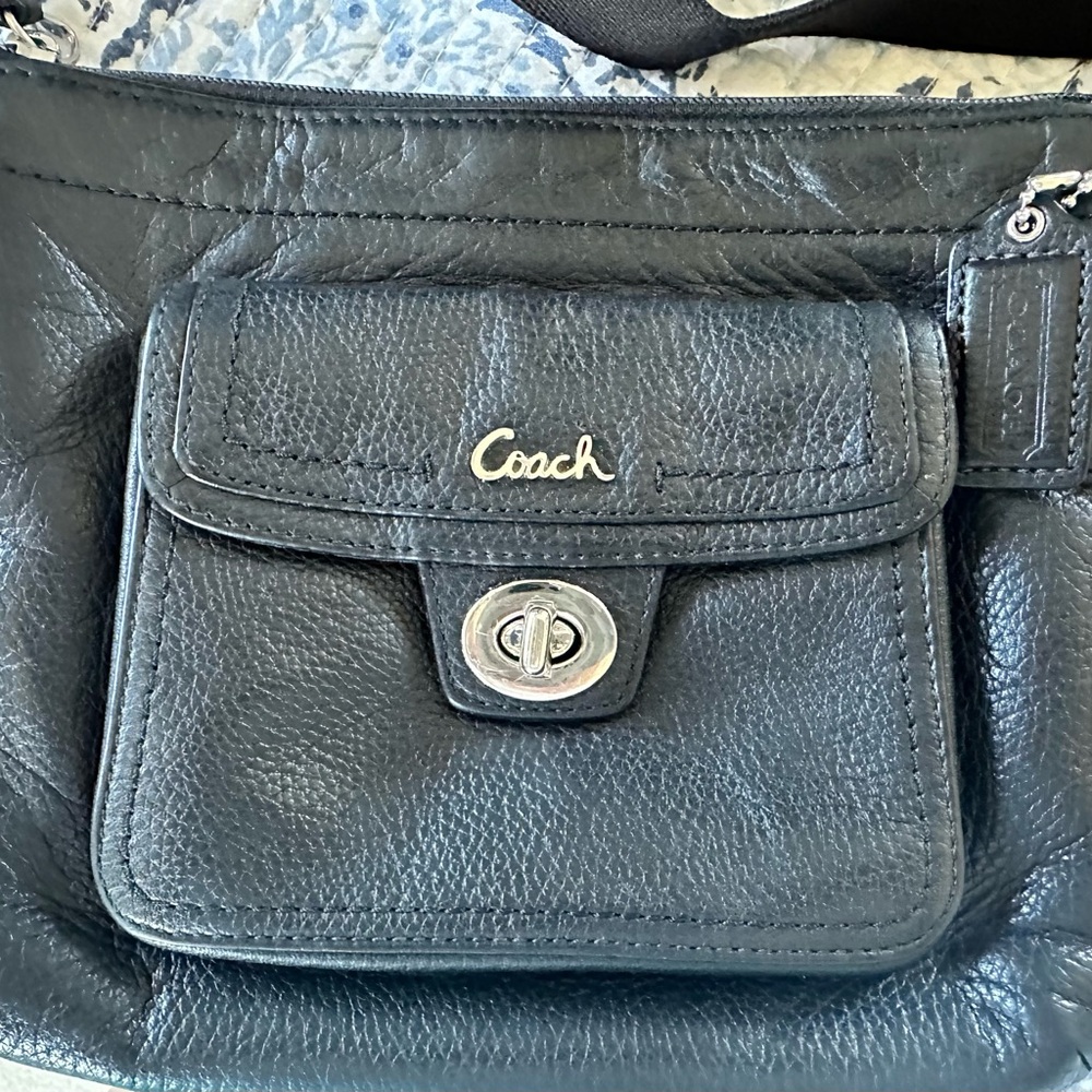 Coach Black Crossbody Bag with Structured Design and Metallic Hardware